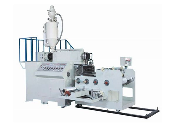 Máquina para fabricar películas adhesivas